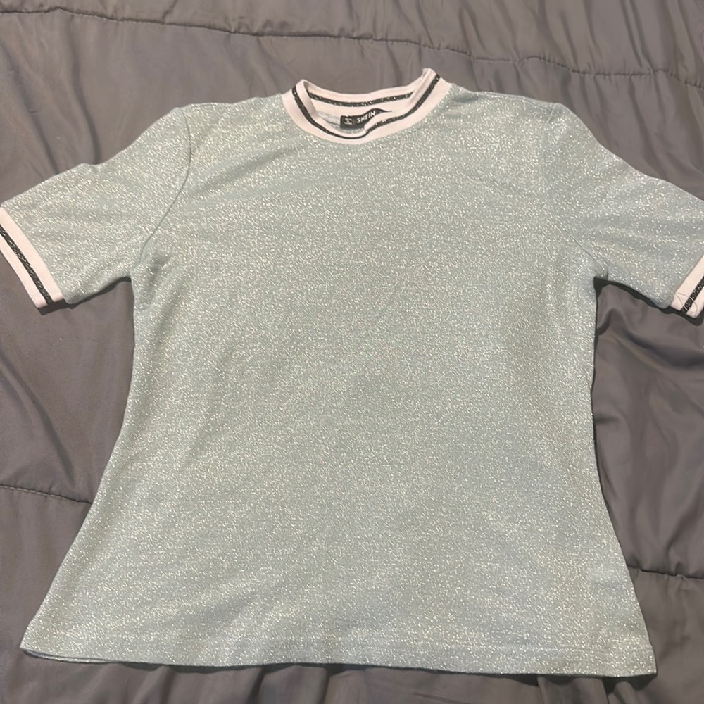 Glitter short sleeve shirt, runs small. Never worn